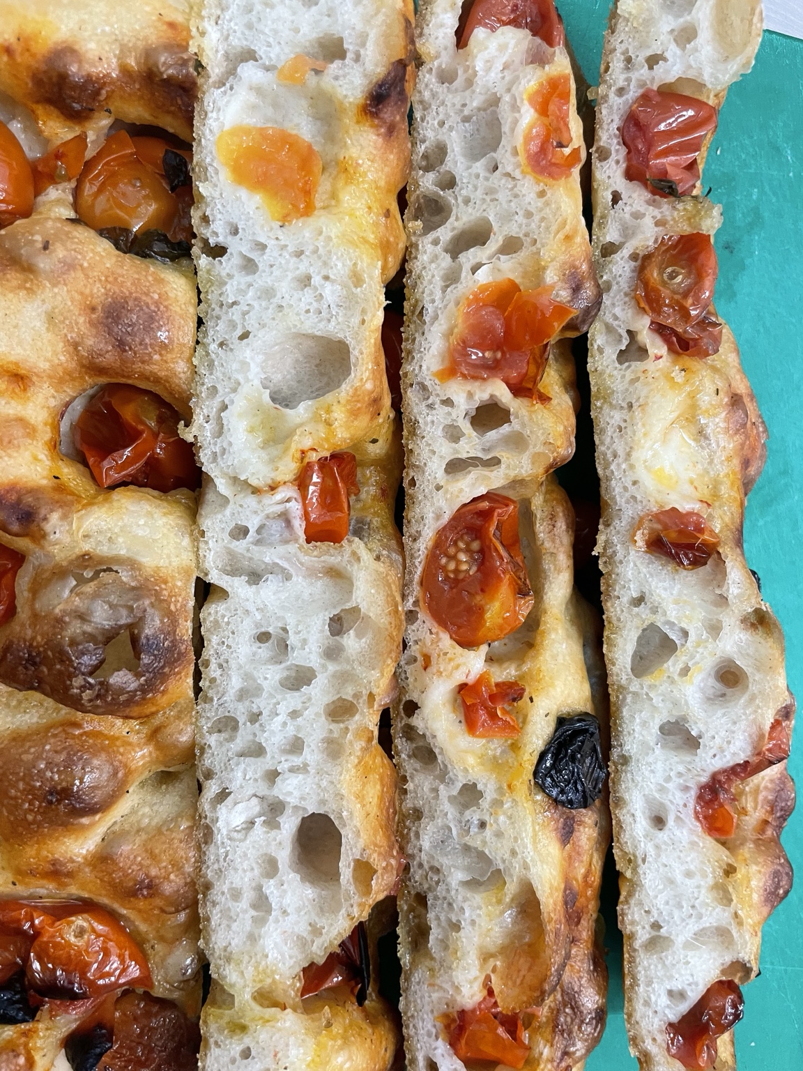 Fresh focaccia with tomatoes