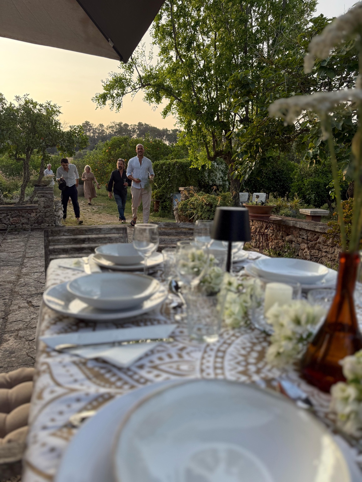 Guests arriving for a private dinner in the garden